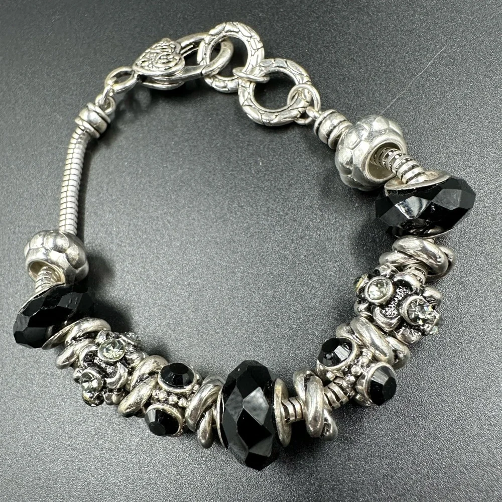 Slider Beaded Charm Bracelet Black and Silver Ornate Faceted Charms Ornate Clasp